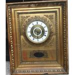 a gilt wood clock by Friedrich Wichman, Vienne circa 1820