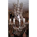 Silvery bronze chandelier and crystal plaques in 9 lights style Louis XV period the end of XIX