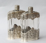 Pair of glass and silver bottles XXth