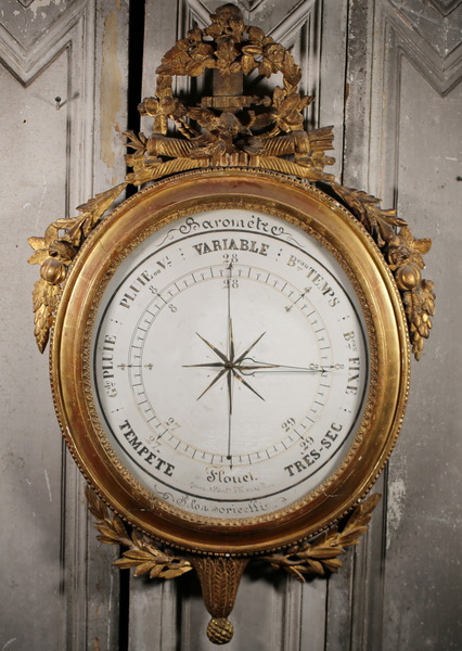 Barometer in gilded and carved wood, Louis XVI period