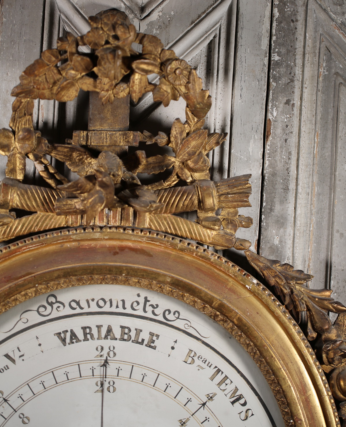 Barometer in gilded and carved wood, Louis XVI period