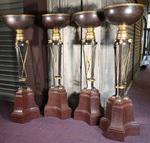 Suite of four antique style floor lamps. 