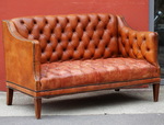 Small padded leather sofa early 20th century 