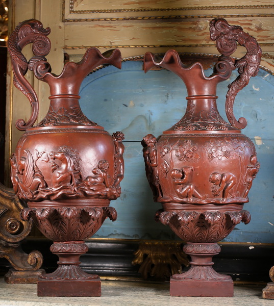 Pair of large Neptune Bacchus ewers