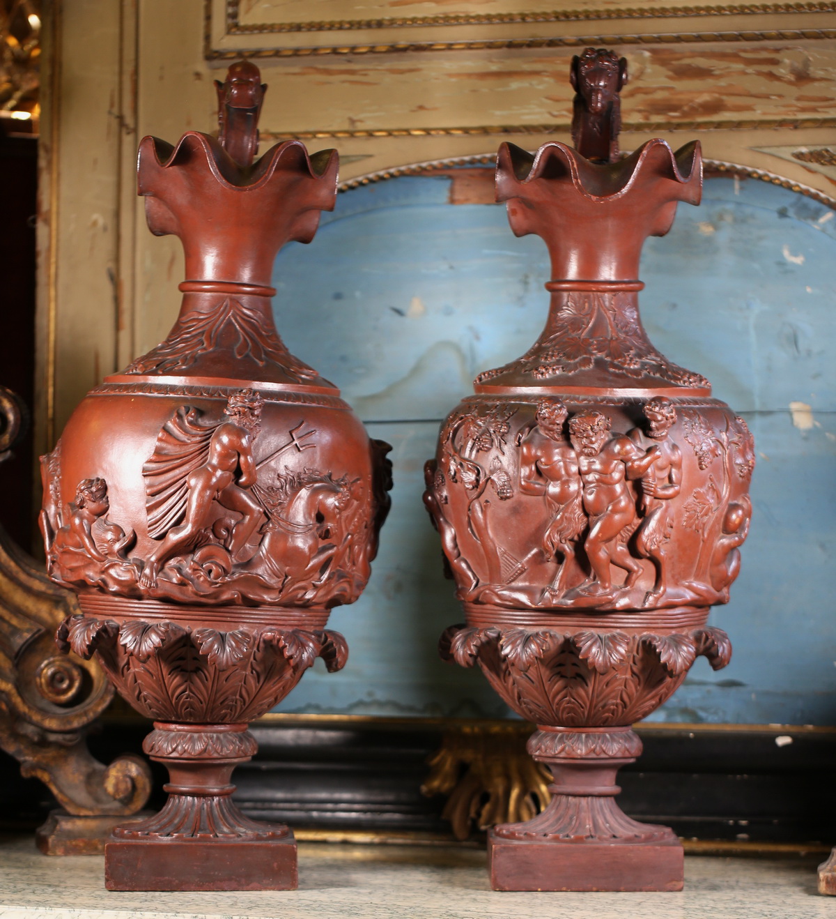 Pair of large Neptune Bacchus ewers