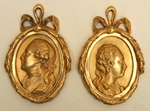 Paire de médaillons bronze doré