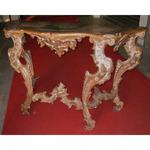 Silvery gold-coloured wooden console and lacquered richly sculptured, Italian work of XVIII